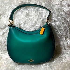 Green Leather Coach handbag.